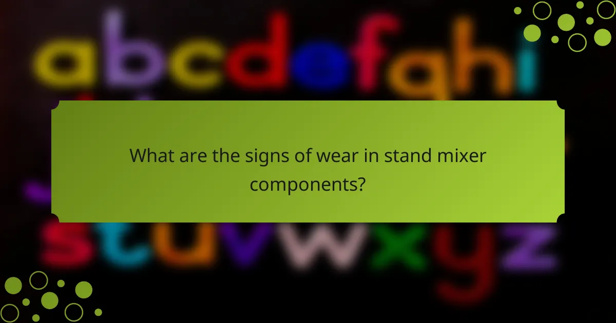 What are the signs of wear in stand mixer components?