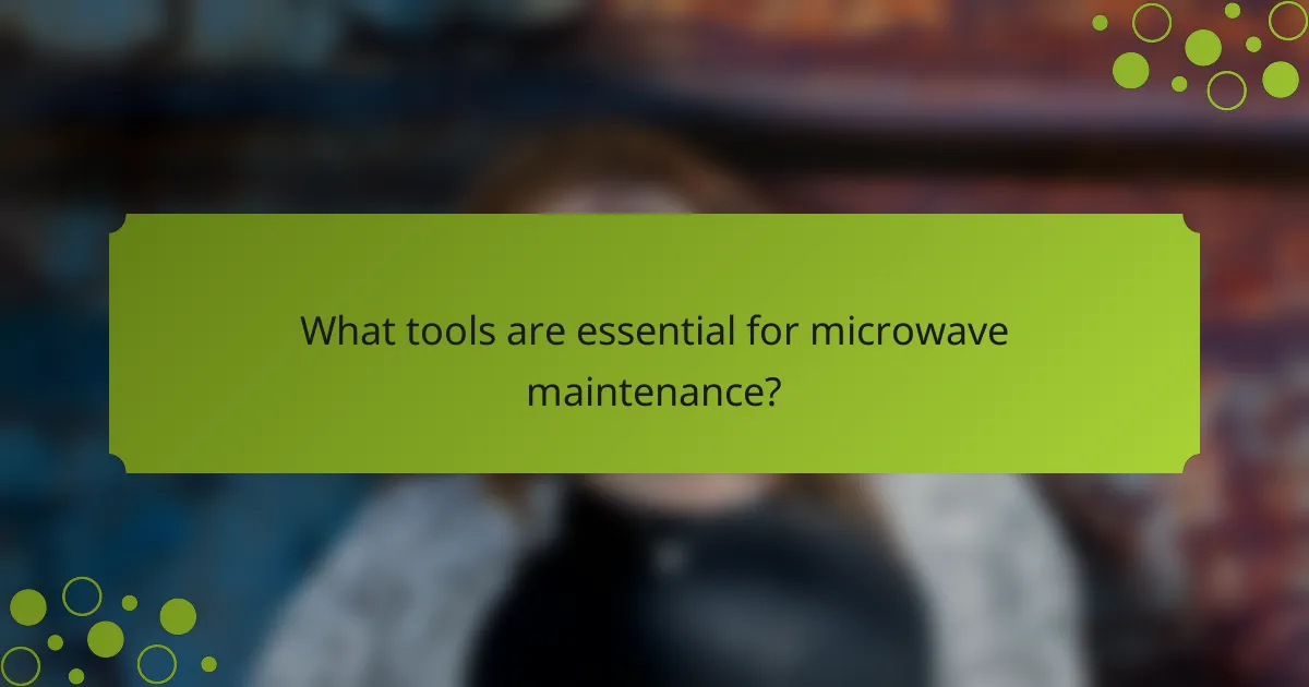 What tools are essential for microwave maintenance?
